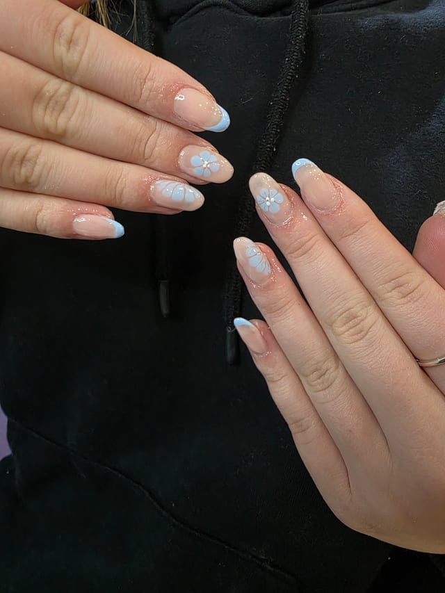 Blue gel nail extensions