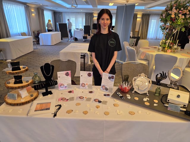 Georgie at a wedding fair pop-up setup